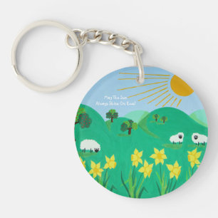 cute sheep with trees hills blue sky and  clouds key ring
