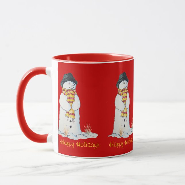 Cute smiling snowman in the snow at christmas mug (Left)