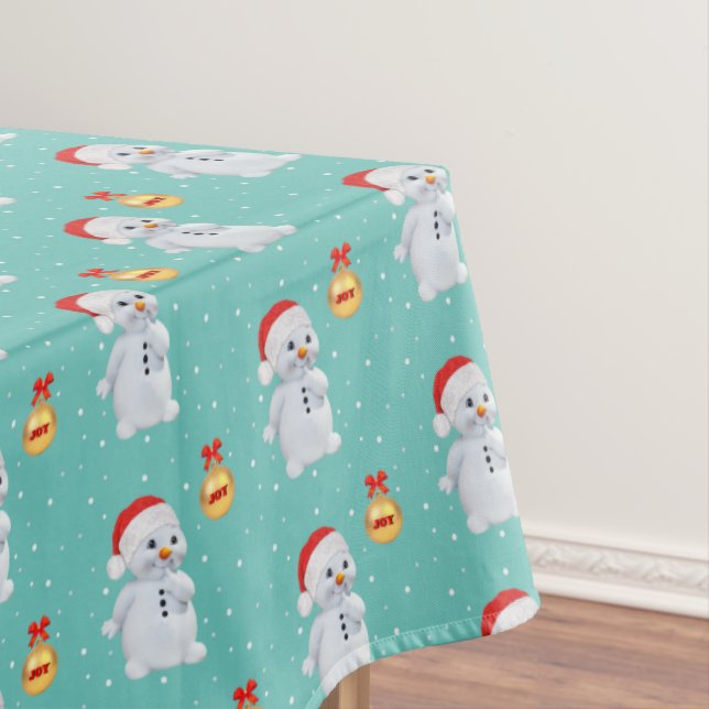 Cute Snowman and Golden Ball on Light Teal Tablecloth (In Situ)