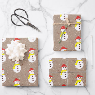 Cute snowman and snow on brown kraft wrapping paper sheet