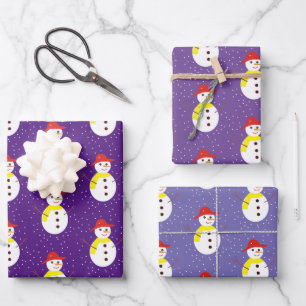 Cute snowman and snow on purple wrapping paper sheet