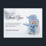 Cute Snowman in Winter Photo Christmas Thank You Postcard<br><div class="desc">Thank you postcard with a cute photograph with a little snowman. Standing outside in the winter with snow falling all around. This cute little guy is dressed up in blue knitted outdoor clothing. Some white/grey bokeh flare in the background.</div>