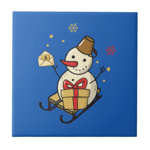 Cute Snowman On A Sled Ceramic Tile