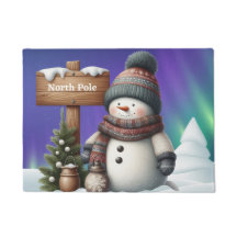 Cute snowman on North Pole with northern lights