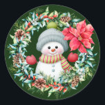 Cute Snowman Wreath Sticker<br><div class="desc">Lovely sticker with an Illustration of a Cute snowman wearing striped scarf,  red gloves and grey green hat,  and watercolor floral wreath placed on a dark green background. To change the background colour just click on the customise button and choose your favourite colour in the colour picker.</div>