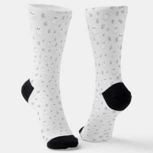 Cute spooky ghost with flowers. Cosy Halloween. Socks