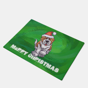 Cute St. Bernard in Santa Hat on Green Doormat