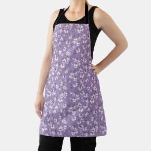 cute tiny white purple flower with blue background apron