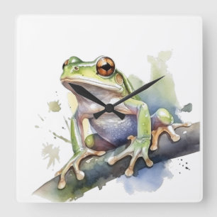 cute tree frog sitting on a branch in watercolor square wall clock