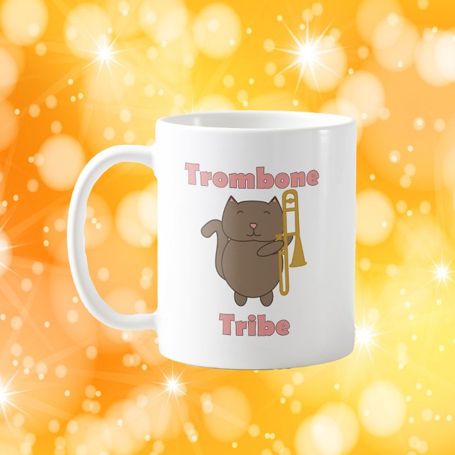 Cute Trombone Cat Illustration Trombone Tribe  Coffee Mug (A mug with a brown cat and a trombone along with the words trombone tribe)