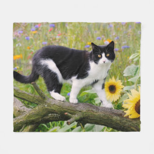 Cute tuxedo cat on a tree branch with sunflowers _ fleece blanket