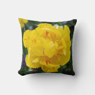 Cute yellow tulips in the garden cushion