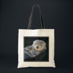 Cutest Baby Animals | Sea Otter Floating Tote Bag<br><div class="desc">This Getty Cutest Baby Animals photo features a relaxed,  fluffy wild Sea Otter floating in a harbour in Monterey,  Central California.</div>