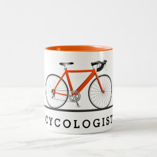 Cycologist text with orange bicycle Two-Tone coffee mug