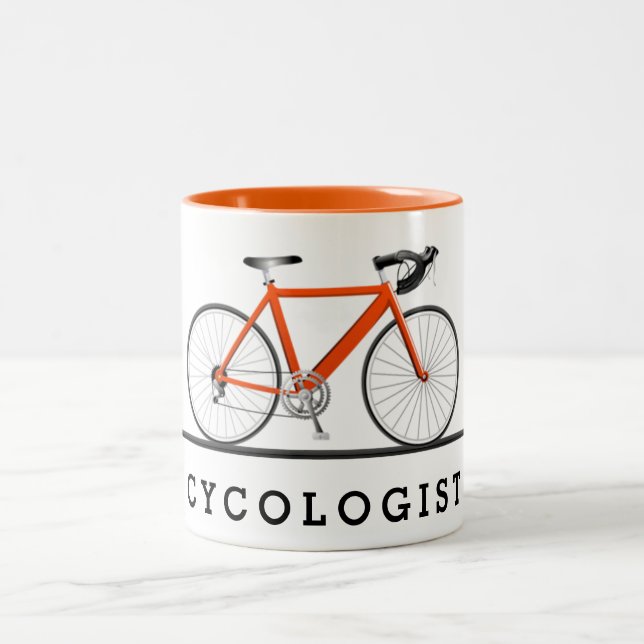 Cycologist text with orange bicycle Two-Tone coffee mug (Center)