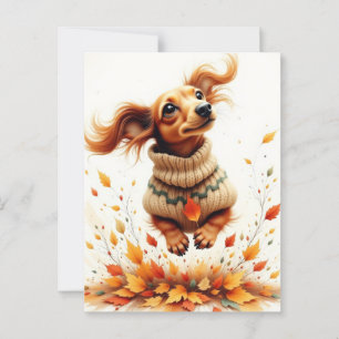 Dachshund playing in the fall leaves postcard