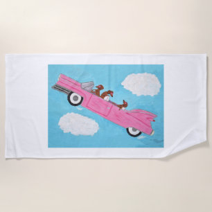 Dachshunds in a Pink Convertible Car Beach Towel