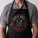 Dad's Grill Personalised Year Established Apron<br><div class="desc">Treat a grill-loving dad to this this awesome custom apron for Father's Day. Cool design for a grillmaster dad features a round logo with "Dad's Grill,  Fine Steaks and Chops" with illustrations of grilling tools,  a flame,  and a cow. Finish the design with the year established.</div>