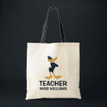 DAFFY DUCK™ with Arms Crossed Teacher Tote Bag<br><div class="desc">Step into the classroom with confidence and style with the Daffy Duck with Arms Crossed Teacher Tote Bag! This durable tote features the iconic Daffy Duck standing with his arms crossed, exuding his unique blend of sass and charm. Made from high-quality materials, this bag is spacious enough to carry books,...</div>