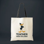 DAFFY DUCK™ with Arms Crossed Teacher Tote Bag<br><div class="desc">Step into the classroom with confidence and style with the Daffy Duck with Arms Crossed Teacher Tote Bag! This durable tote features the iconic Daffy Duck standing with his arms crossed, exuding his unique blend of sass and charm. Made from high-quality materials, this bag is spacious enough to carry books,...</div>