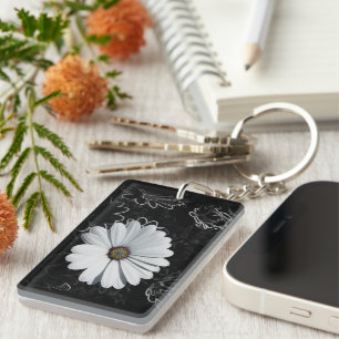 Daisies and shades of grey key ring