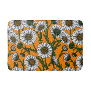 Daisies on orange bath mat