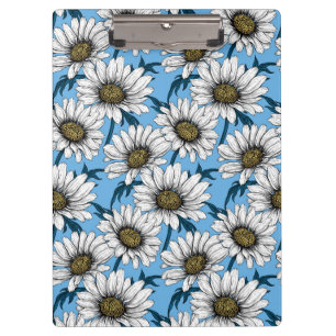 Daisies, wild flowers on blue clipboard