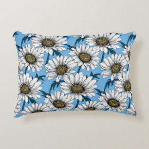Daisies, wild flowers on blue decorative cushion