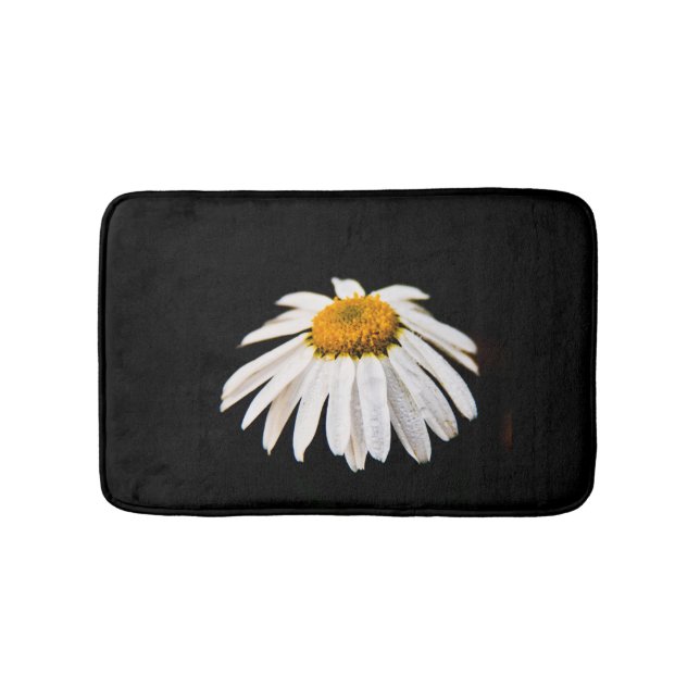 Daisy on black background bath mat (Front)