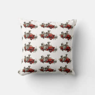 Dalmatian Pups with a Toy Fire Truck Cushion