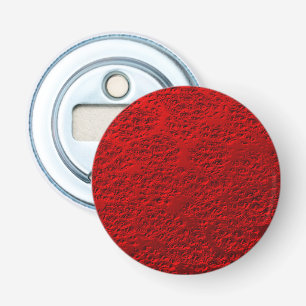 Damaged red metal bottle opener