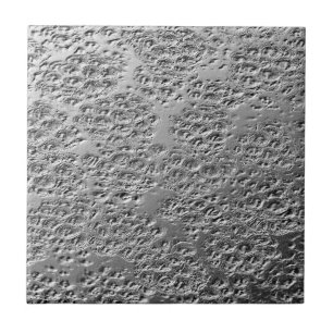 Damaged silver ceramic tile