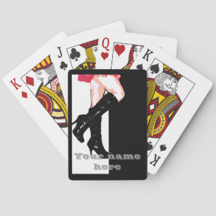 Dancing girl in long boots and miniskirt playing cards