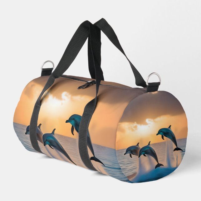 Dancing in the Dusk: Three Dolphins Leaping  Duffle Bag (Left Corner)