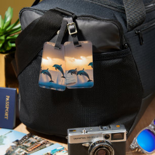 Dancing in the Dusk: Three Dolphins Leaping Luggage Tag