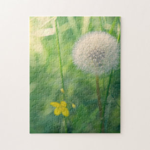 Dandelion in greenery with soft summer light jigsaw puzzle