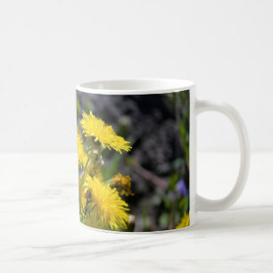 Dandelion on coffee mug