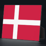 Danish Flag Plaque<br><div class="desc">Add a touch of Danish pride to your space with our exclusive plaque featuring the flag of Denmark! Crafted with meticulous attention to detail, this plaque is more than just a decorative piece; it’s a celebration of Denmark’s heritage and cultural pride. The vibrant design prominently displays the iconic Danish flag,...</div>