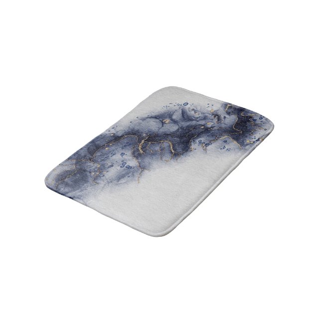 Dark blue and gold watercolor ink marks bath mat (Angled)