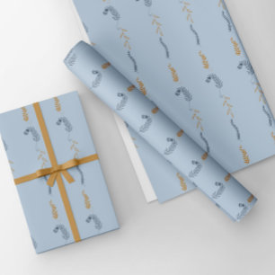 Dark blue and golden floral doodles in blue wrapping paper sheet