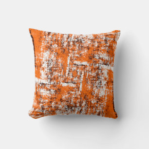 Dark brown grunge background. Black white orange o Cushion