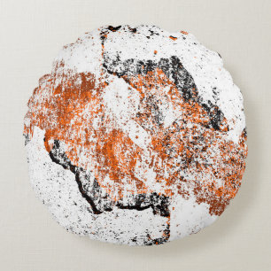 Dark brown grunge background. Black white orange o Round Cushion
