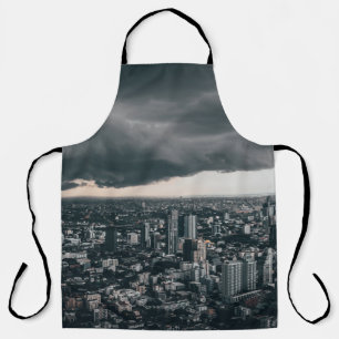 DARK CLOUD ABOVE CITY BUILDINGS APRON