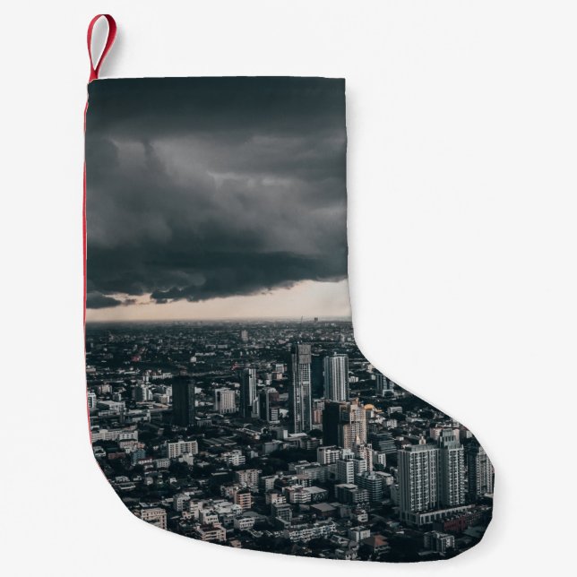 DARK CLOUD ABOVE CITY BUILDINGS SMALL CHRISTMAS STOCKING (Front)
