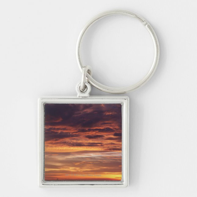 Dark clouds in orange streaked sky key ring (Front)