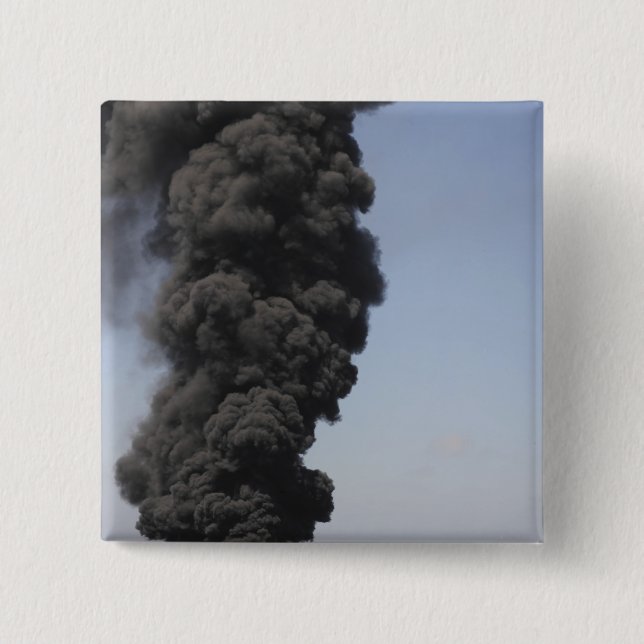 Dark clouds of smoke and fire emerge 15 cm square badge (Front)