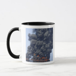 Dark clouds of smoke and fire emerge 2 mug