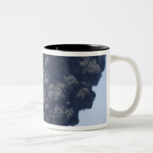 Dark clouds of smoke and fire emerge 2 Two-Tone coffee mug