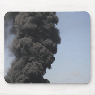 Dark clouds of smoke and fire emerge mouse pad