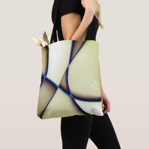 Dark curved lines on blue shadow over cream beige tote bag